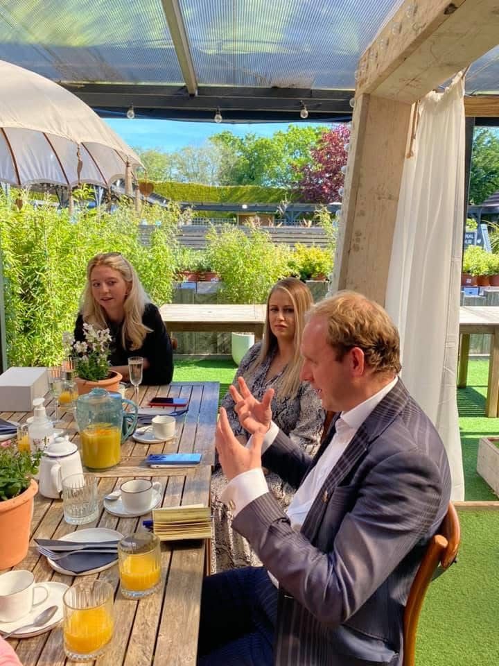 Daniel Fitzhenry making a point at the breakfast table, The Garden Society, Eastleigh