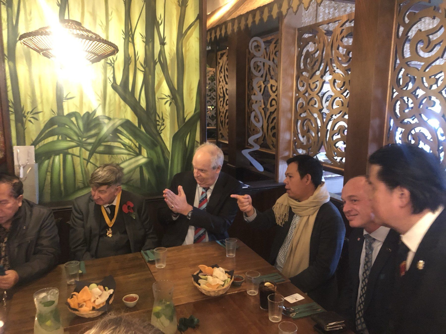 Daniel Fitzhenry's guests, including Sultan Bachtiar Najamudin and the Mayor, in lively conversation over lunch